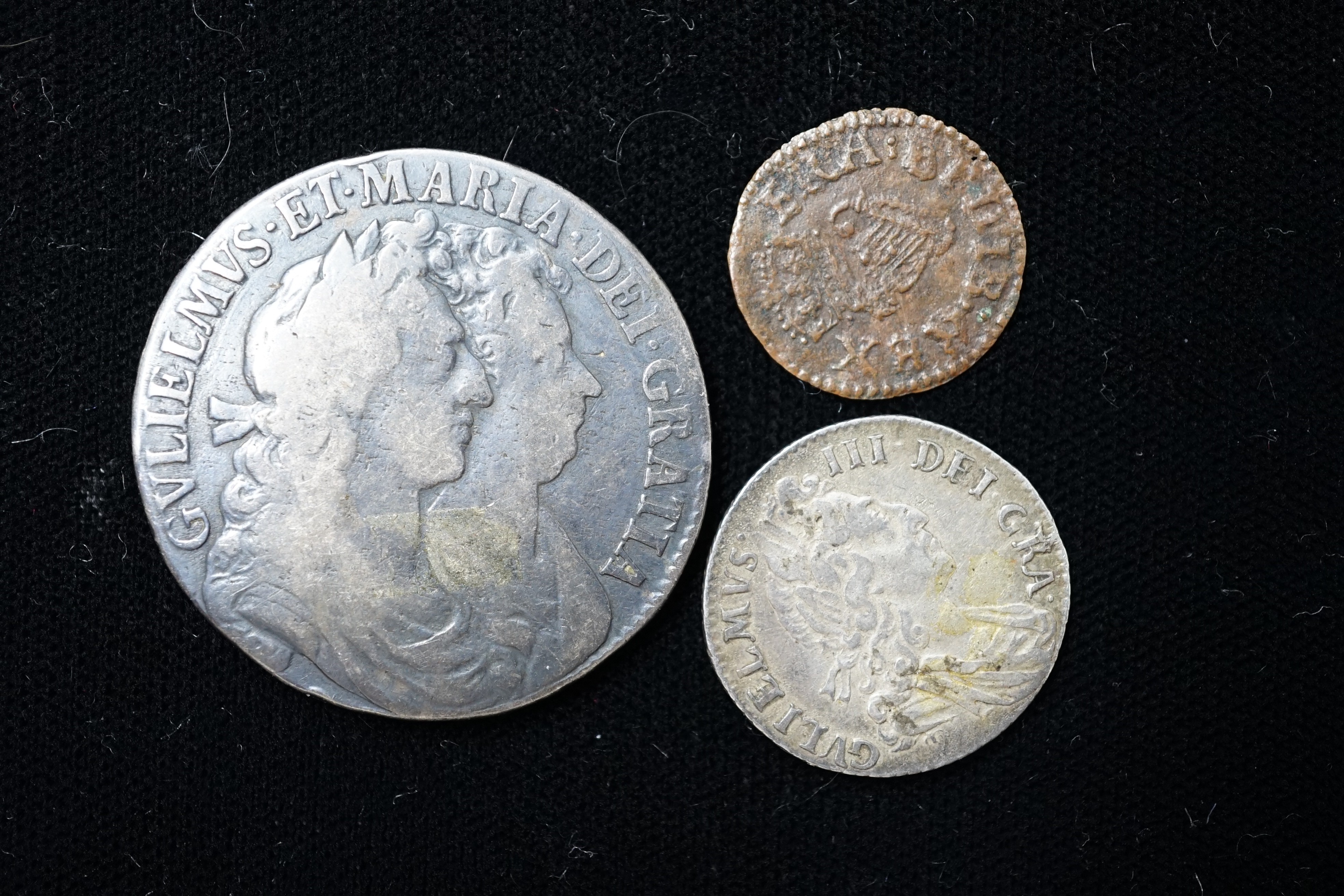 A William & Mary halfcrown 1689, first crowned shield, VG, and a William III sixpence 1697, VF and a Charles I Royal farthing probably S3181